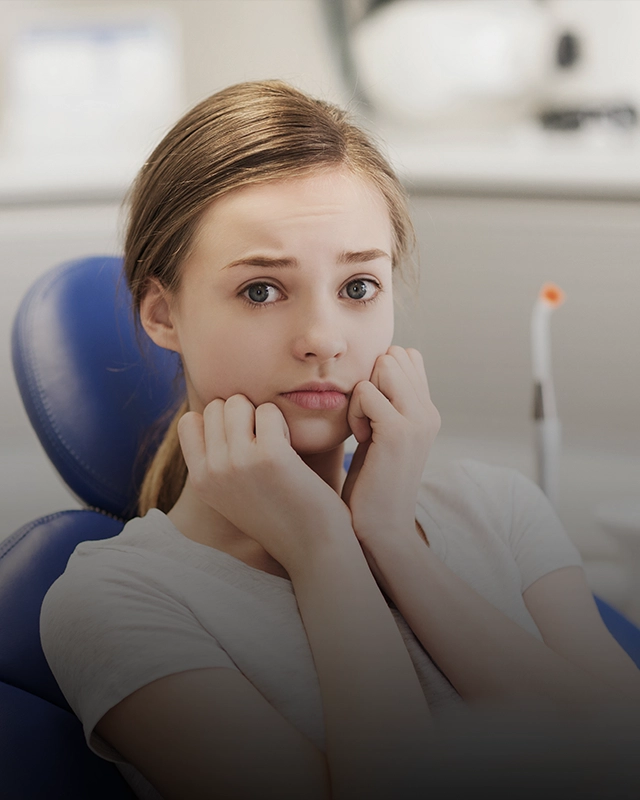 Apprehensive Girl In Dental Chair