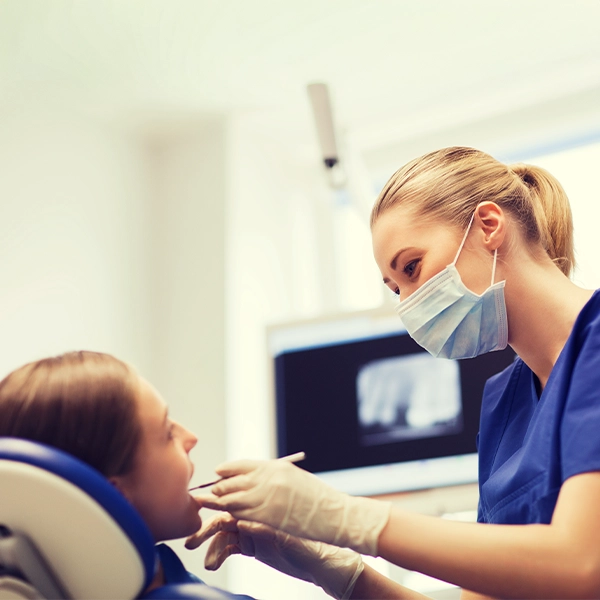 Patient Receiving Dental Checkup